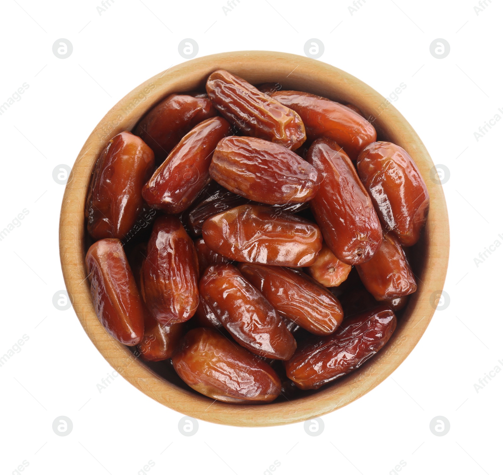 Photo of Tasty sweet dried dates in wooden bowl on white background, top view