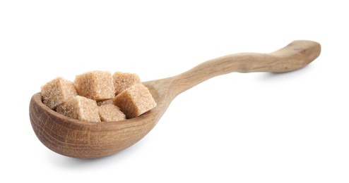 Photo of Brown sugar cubes in wooden spoon isolated on white