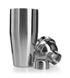 Photo of Metal cocktail shaker, strainer and cap isolated on white