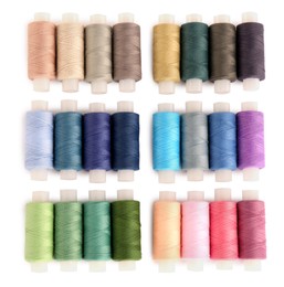 Photo of Set of colorful sewing threads on white background, top view