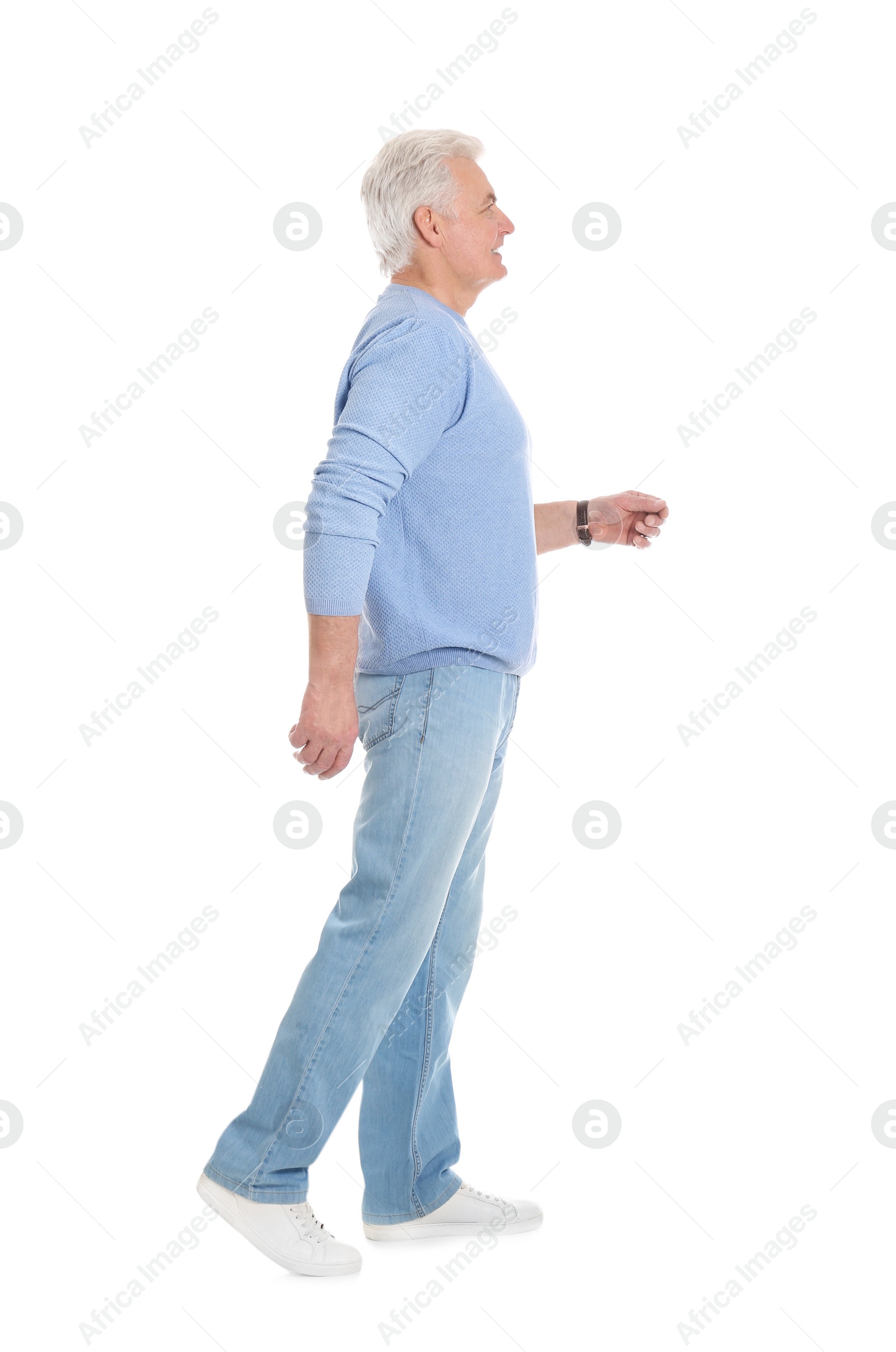 Photo of Handsome mature man in stylish clothes on white background