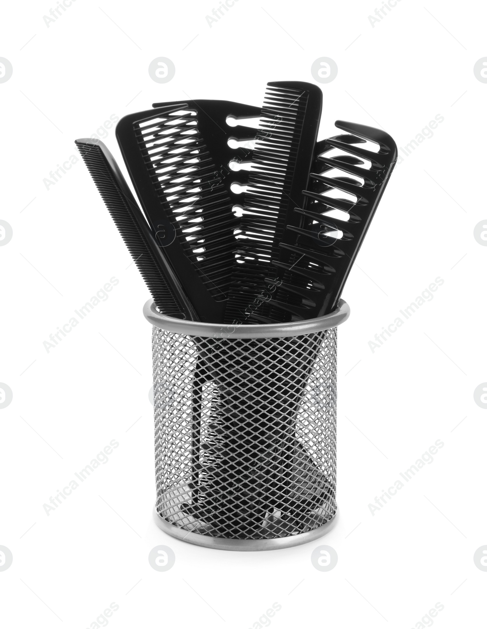 Photo of Set of professional hair combs in metal holder isolated on white