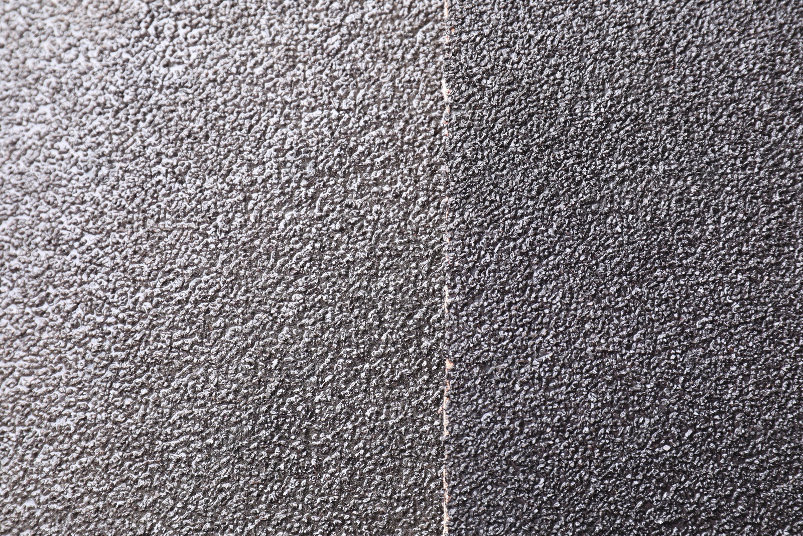 Photo of Sheets of coarse sandpaper as background, top view