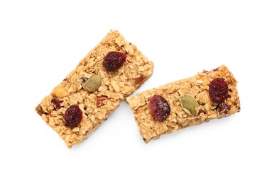 Photo of Tasty granola bars with berries isolated on white, top view