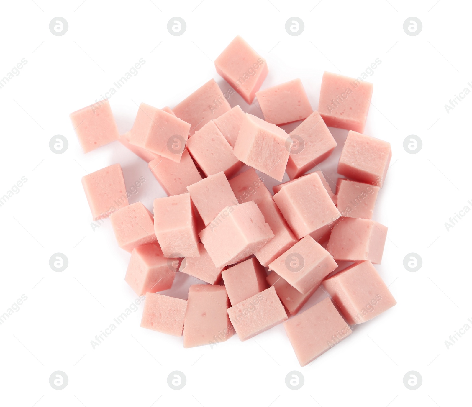 Photo of Cubes of tasty boiled sausage on white background, top view