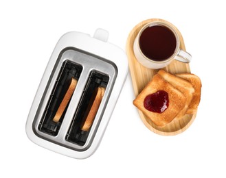 Toaster with roasted bread, jam and tea on white background, top view