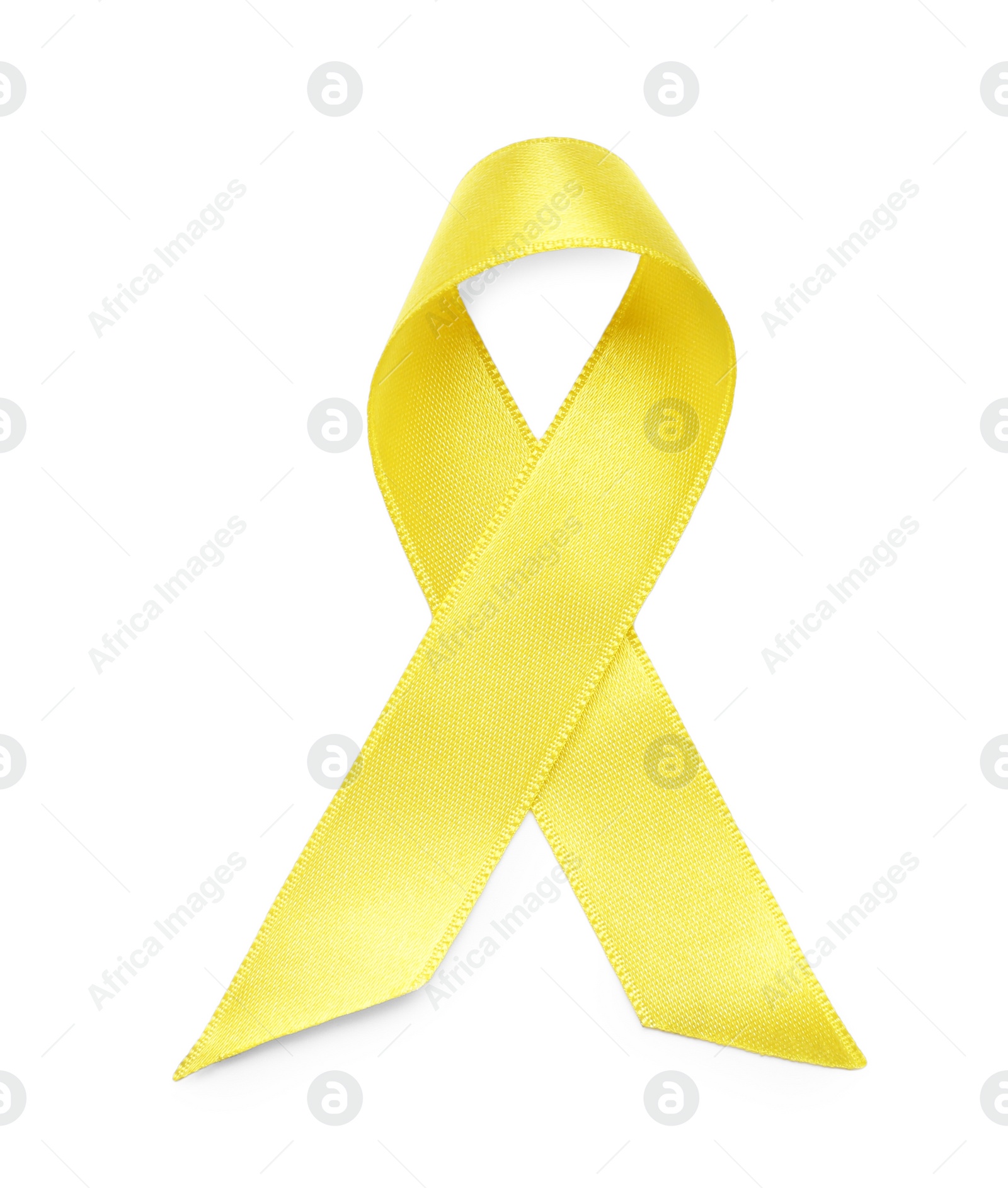 Photo of Yellow ribbon isolated on white, top view