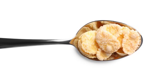 Metal spoon of tasty crispy corn flakes on white background, top view