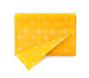 Beeswax food wrap on white background, top view