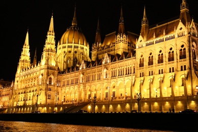 BUDAPEST, HUNGARY - APRIL 27, 2019: Beautiful night cityscape with illuminated Parliament Building