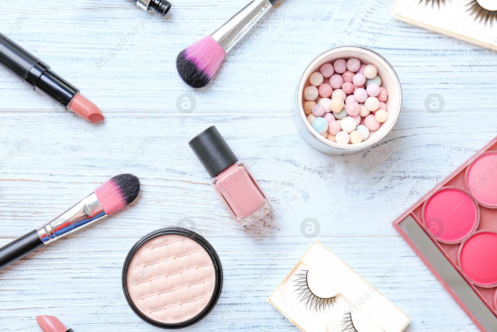 Photo of Flat lay composition with cosmetic products on wooden background