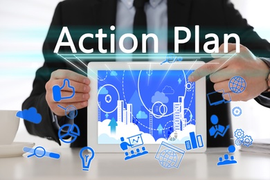 Image of Action plan. Different icons on virtual screen and man holding tablet, closeup 