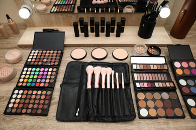 Photo of Professional makeup artists workplace with tools and cosmetic