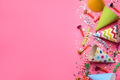 Photo of Beautiful flat lay composition with festive items on pink background, space for text. Surprise party concept