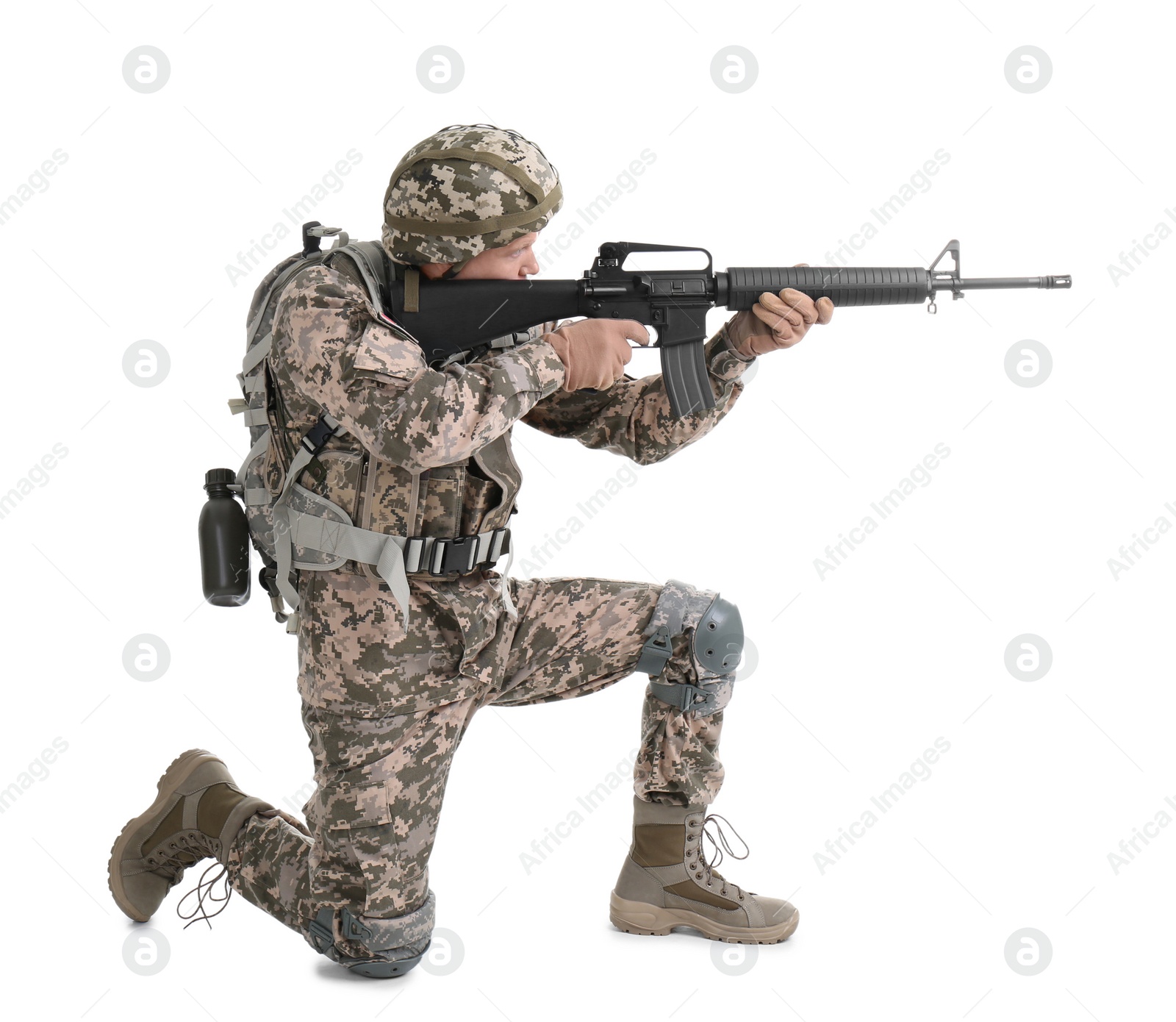 Photo of Male soldier with machine gun on white background. Military service