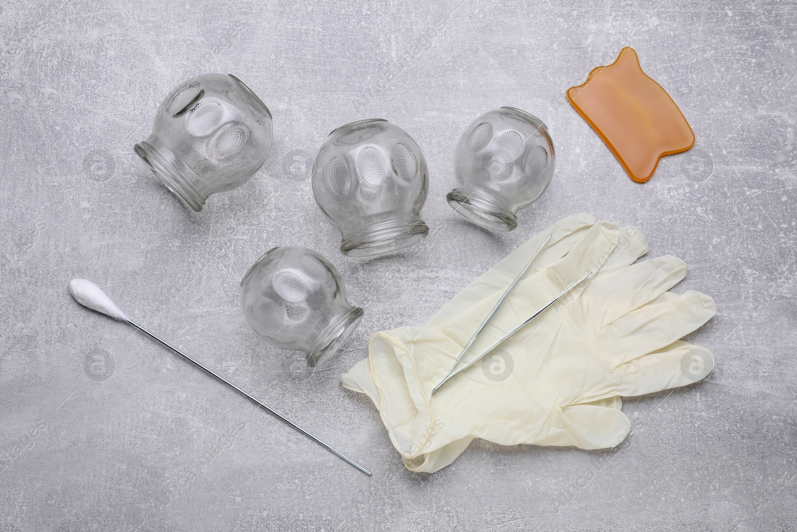 Photo of Cupping set on grey table, flat lay