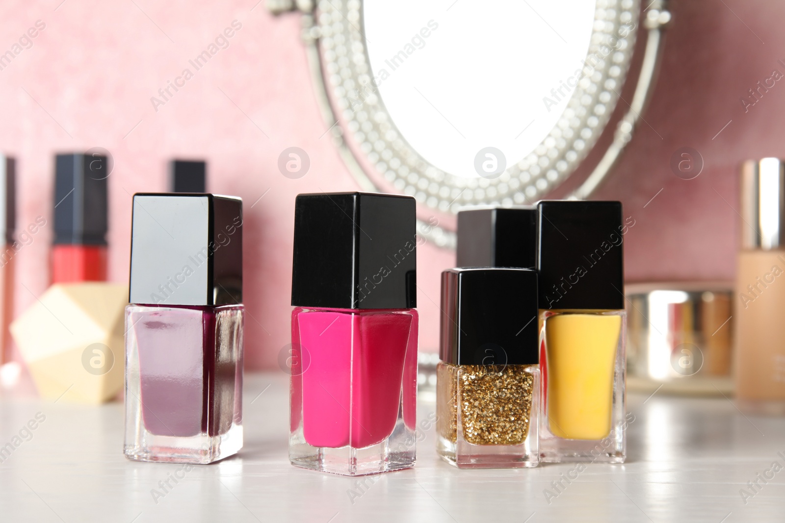 Photo of Bottles of nail polish on dressing table