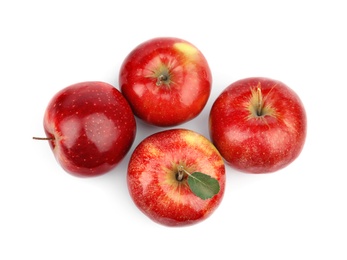 Photo of Ripe juicy red apples with leaf on white background, top view