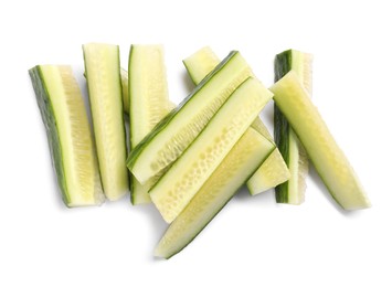 Photo of Pieces of fresh cucumber isolated on white, top view