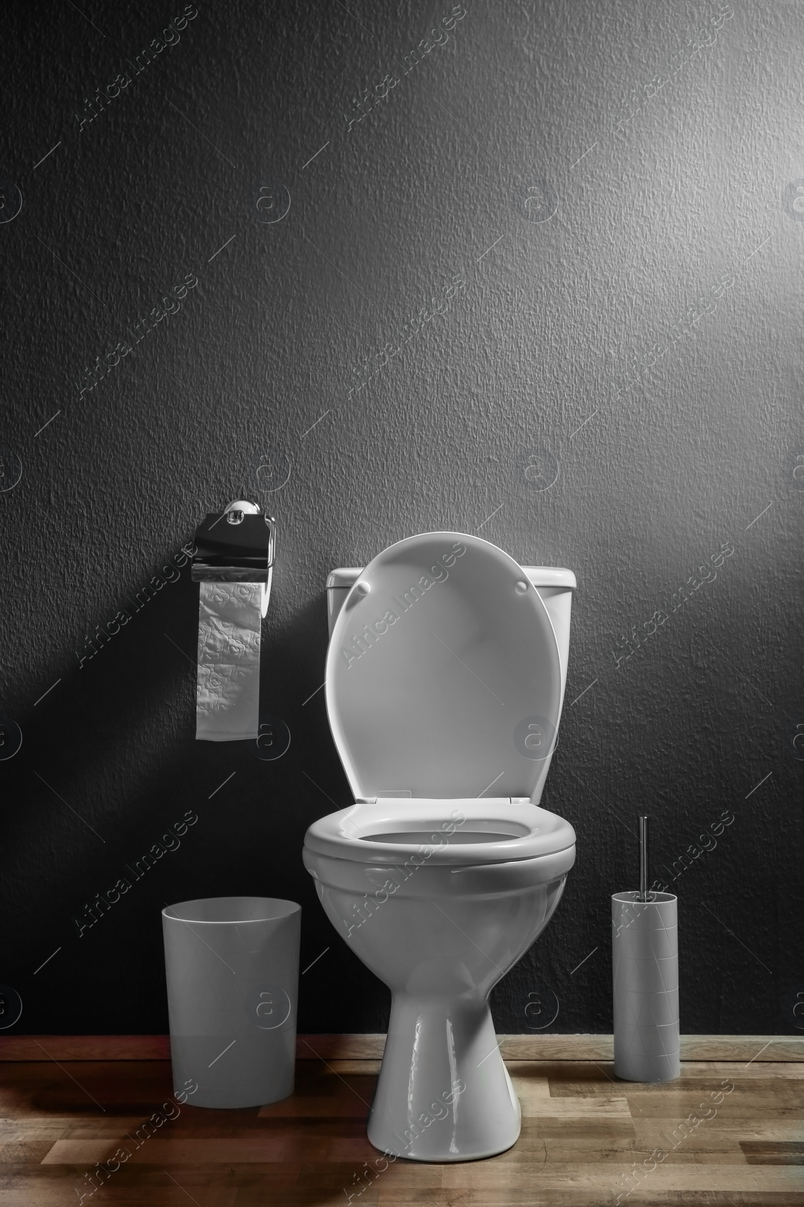 Photo of New ceramic toilet bowl in modern bathroom