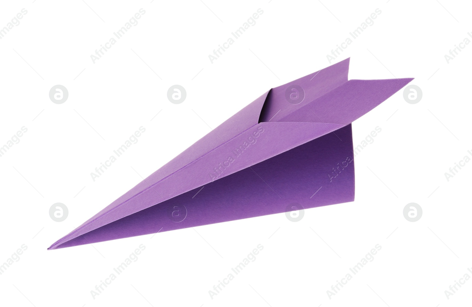 Photo of Handmade purple paper plane isolated on white