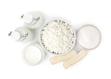 Photo of Different fresh dairy products isolated on white, top view