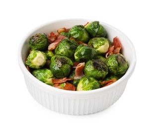Delicious roasted Brussels sprouts and bacon in bowl isolated on white