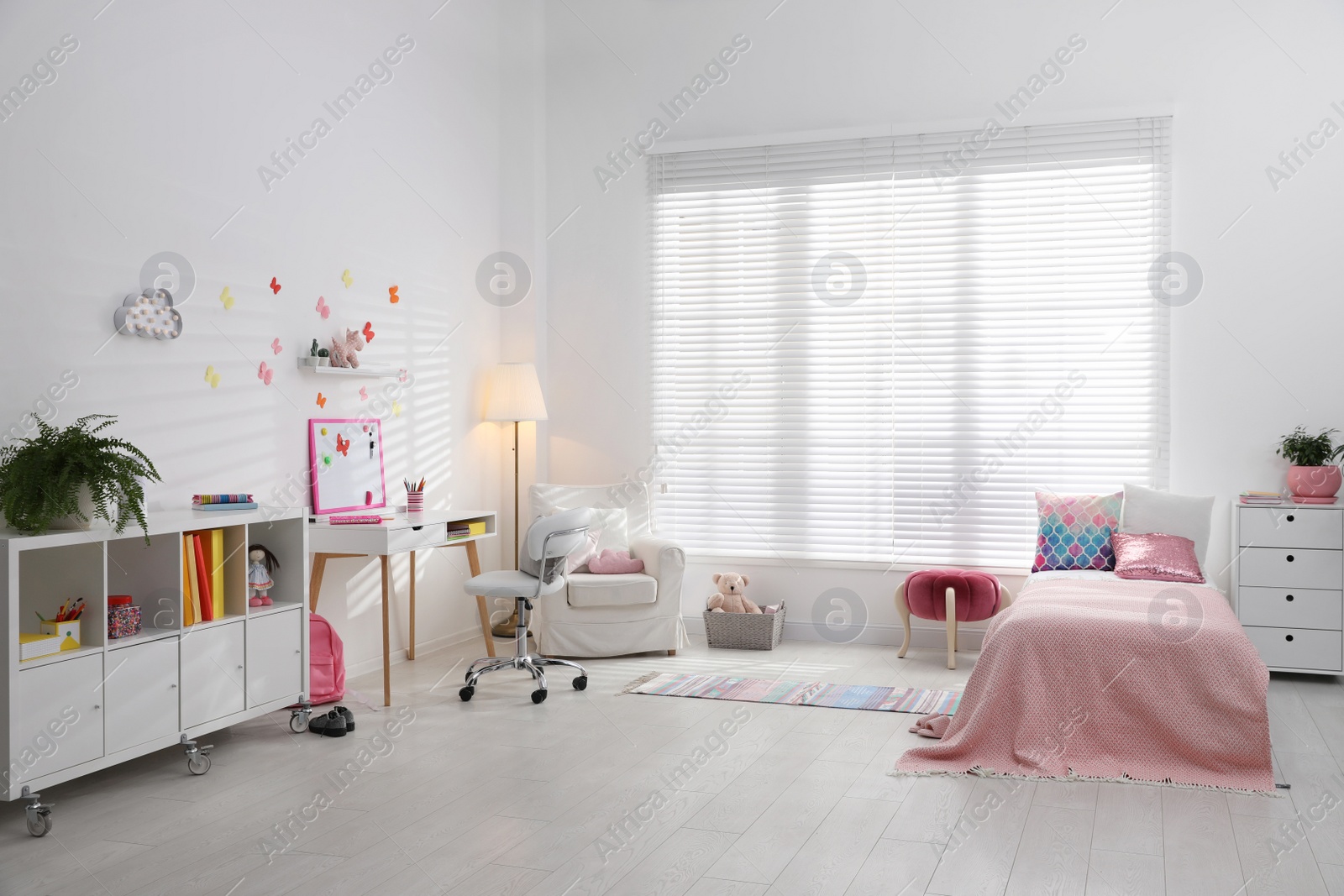 Photo of Modern child room interior with comfortable bed