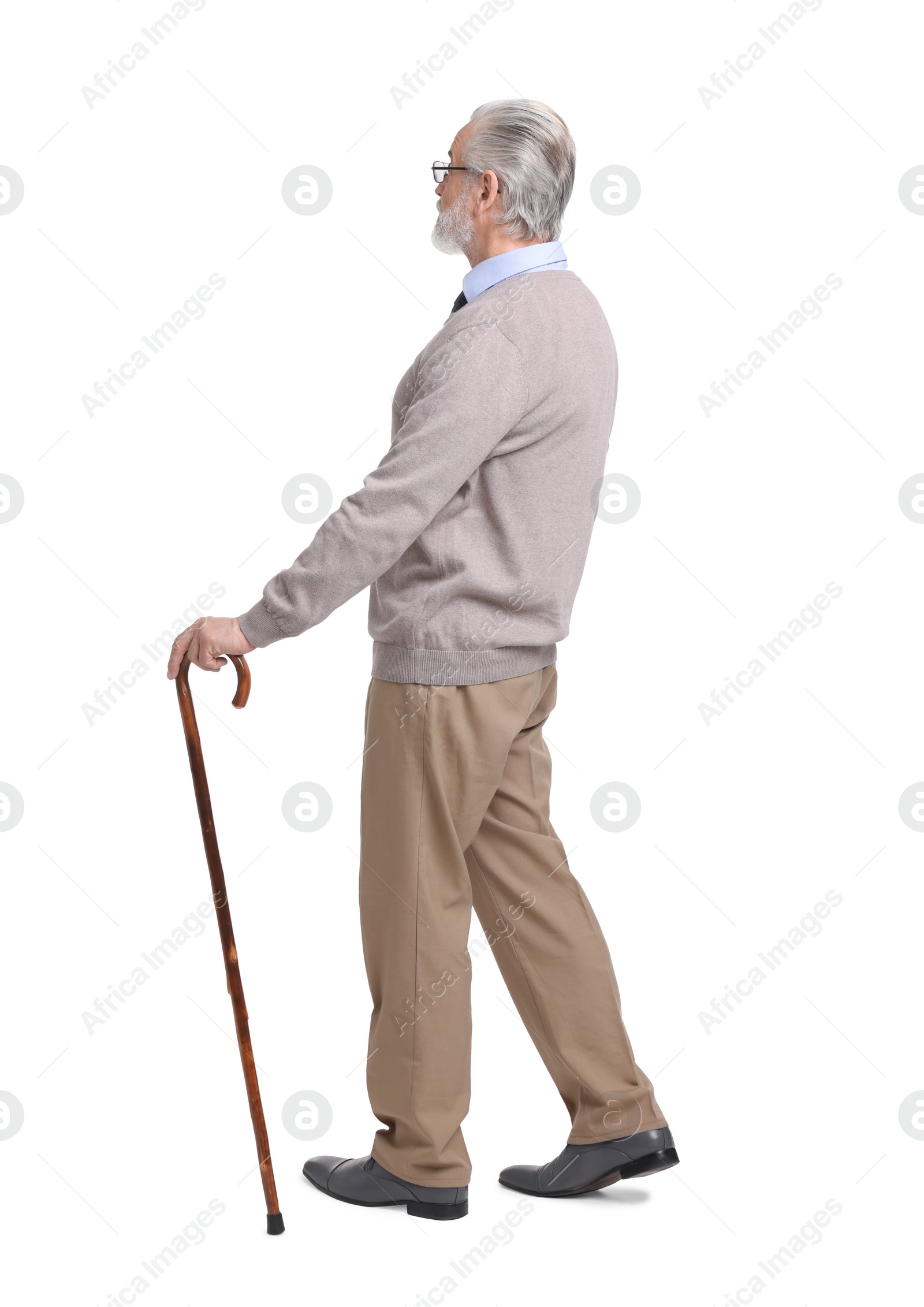 Photo of Senior man with walking cane on white background