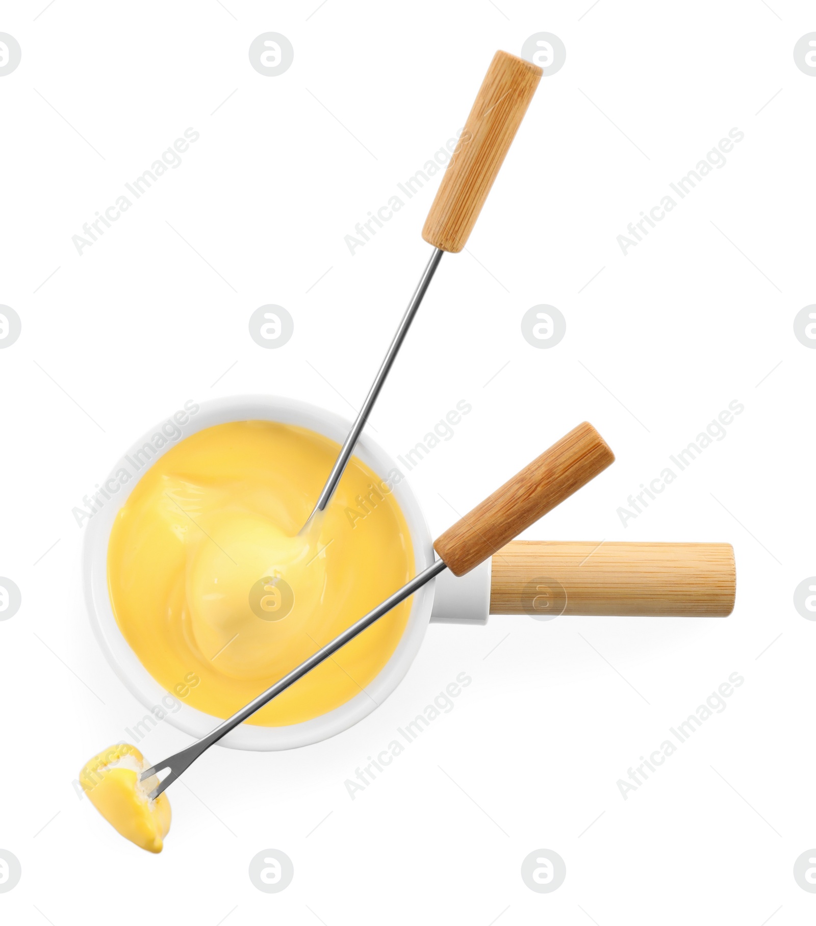 Photo of Pot of tasty cheese fondue and forks isolated on white, top view