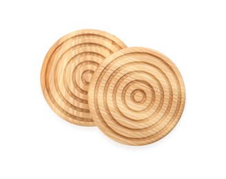 Wooden cup coasters on white background, top view