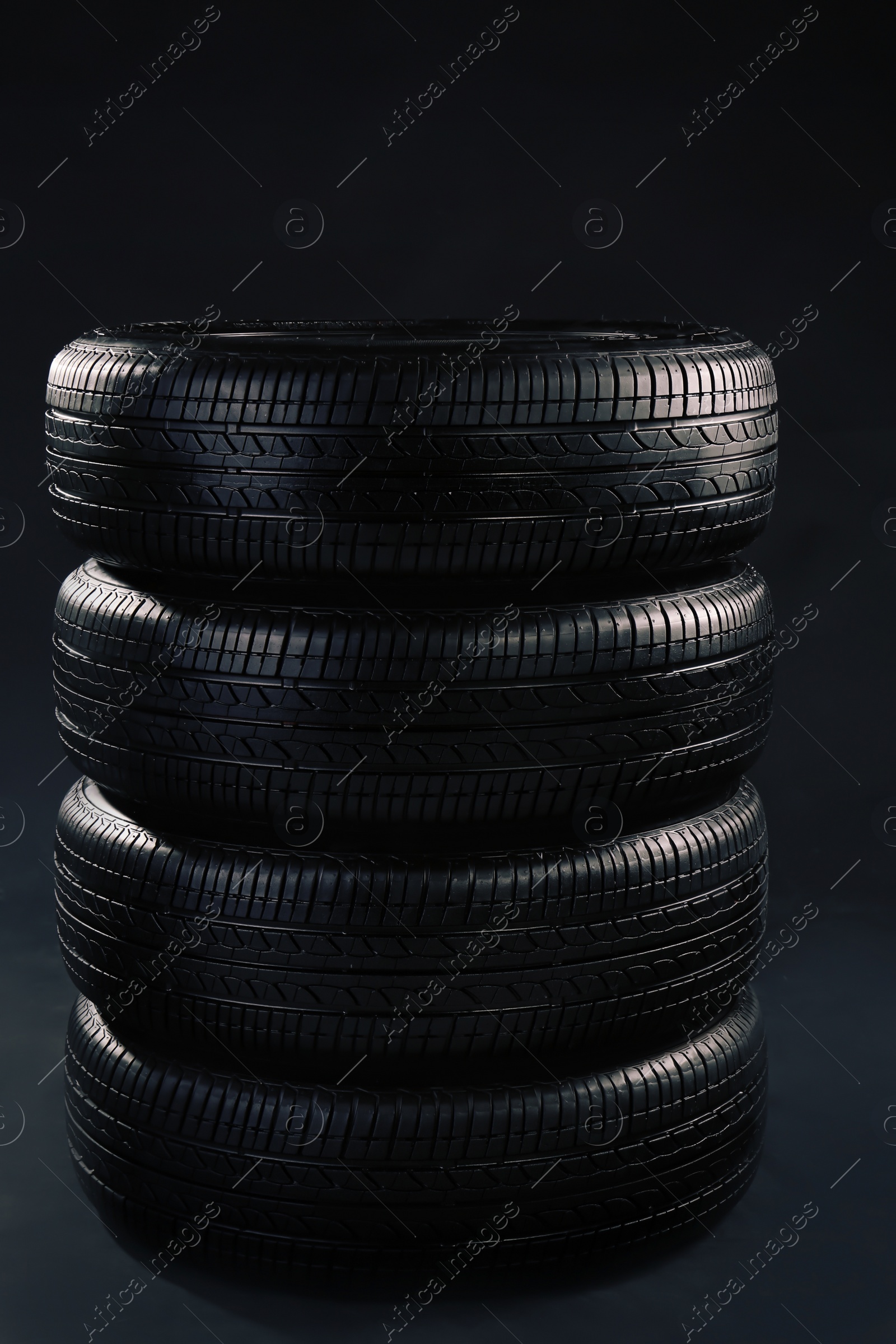 Photo of Car tires on grey background