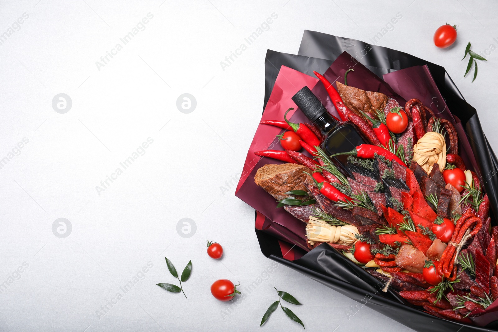 Photo of Beautiful food bouquet on light background, flat lay. Space for text