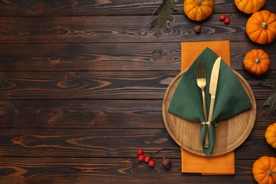 Autumn table setting and pumpkins, flat lay. Space for text