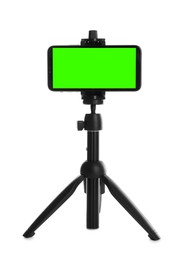 Image of Smartphone with green screen fixed to tripod on white background. Mockup for design