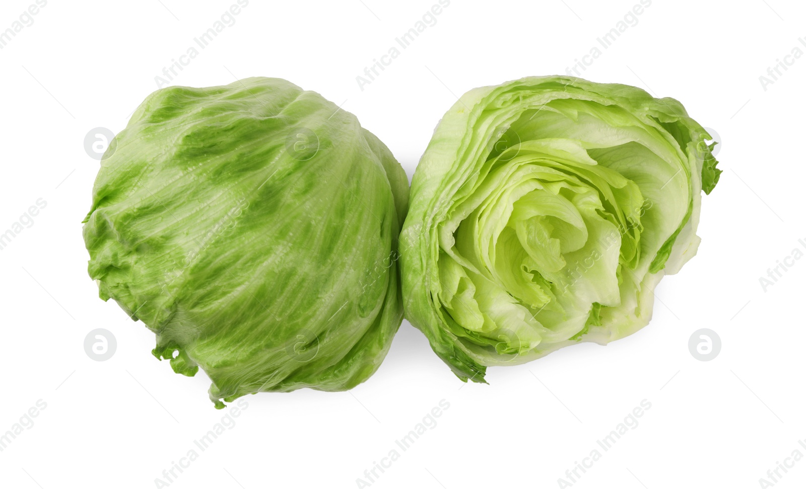 Photo of Whole and cut fresh green iceberg lettuces isolated on white, top view