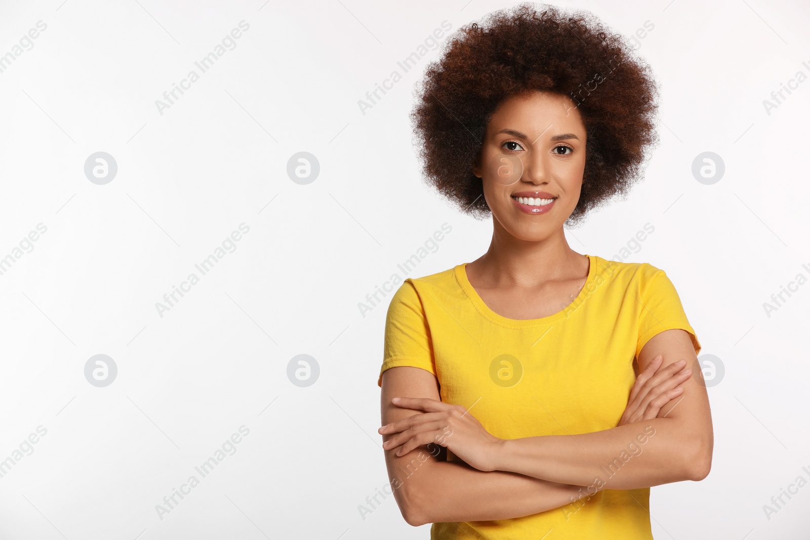 Photo of Portrait of beautiful young woman with glamorous makeup on white background. Space for text