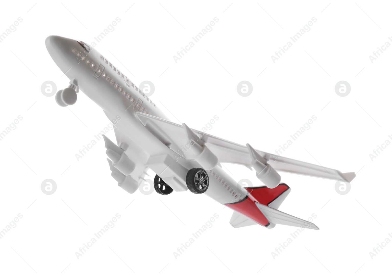 Photo of Toy airplane isolated on white. Travel concept