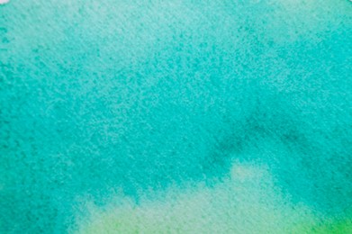 Photo of Abstract turquoise watercolor painting as background, top view