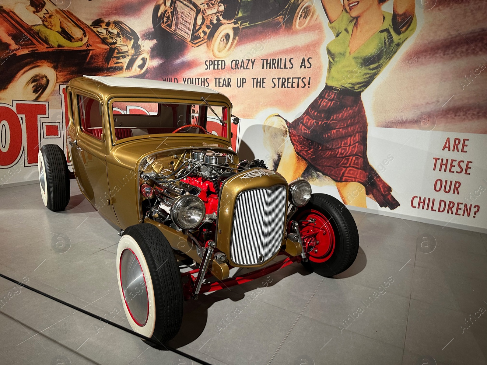 Photo of Hague, Netherlands - November 8, 2022: Beautiful view of golden retro car in Louwman museum