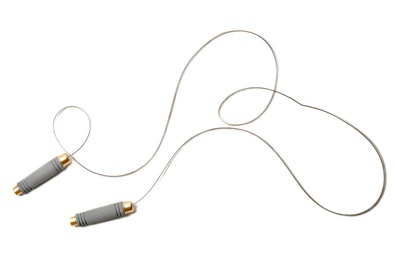 Photo of Jump rope on white background, top view