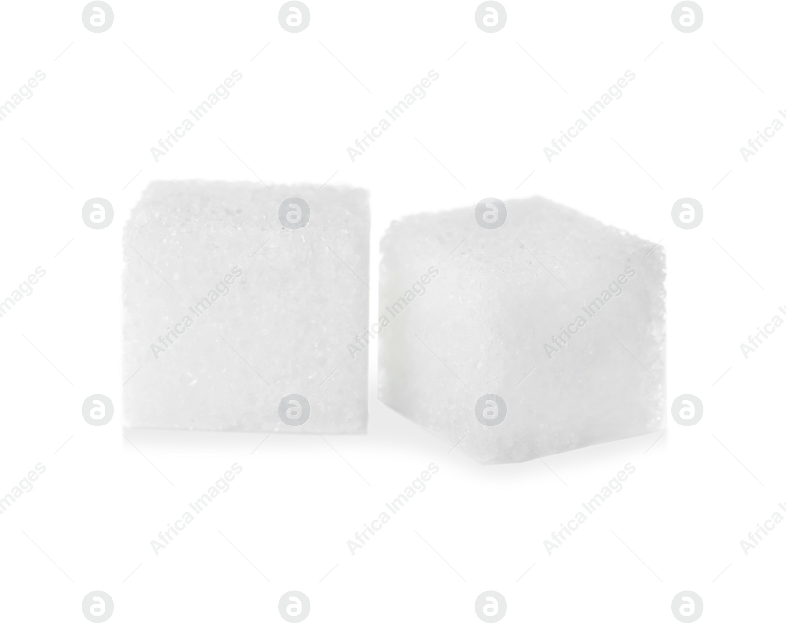 Photo of Pure refined sugar cubes isolated on white