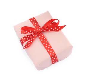 Beautiful gift box with red bow isolated on white