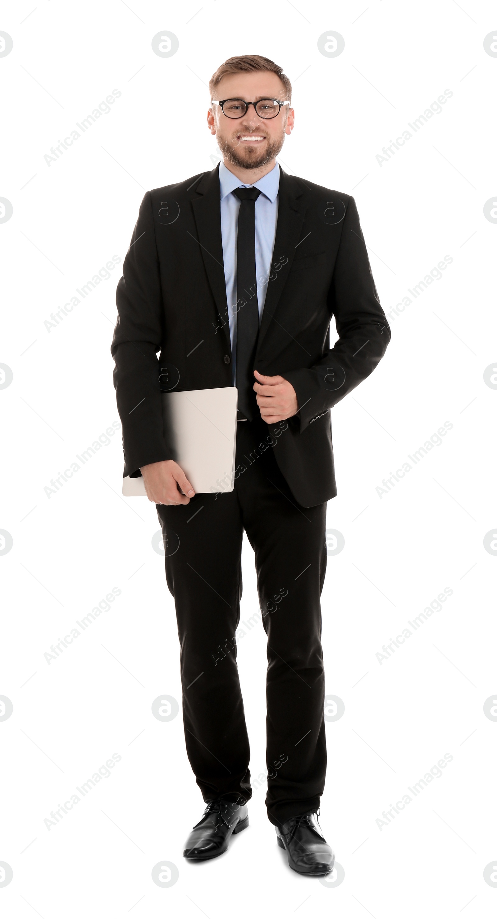 Photo of Happy young businessman holding laptop on white background