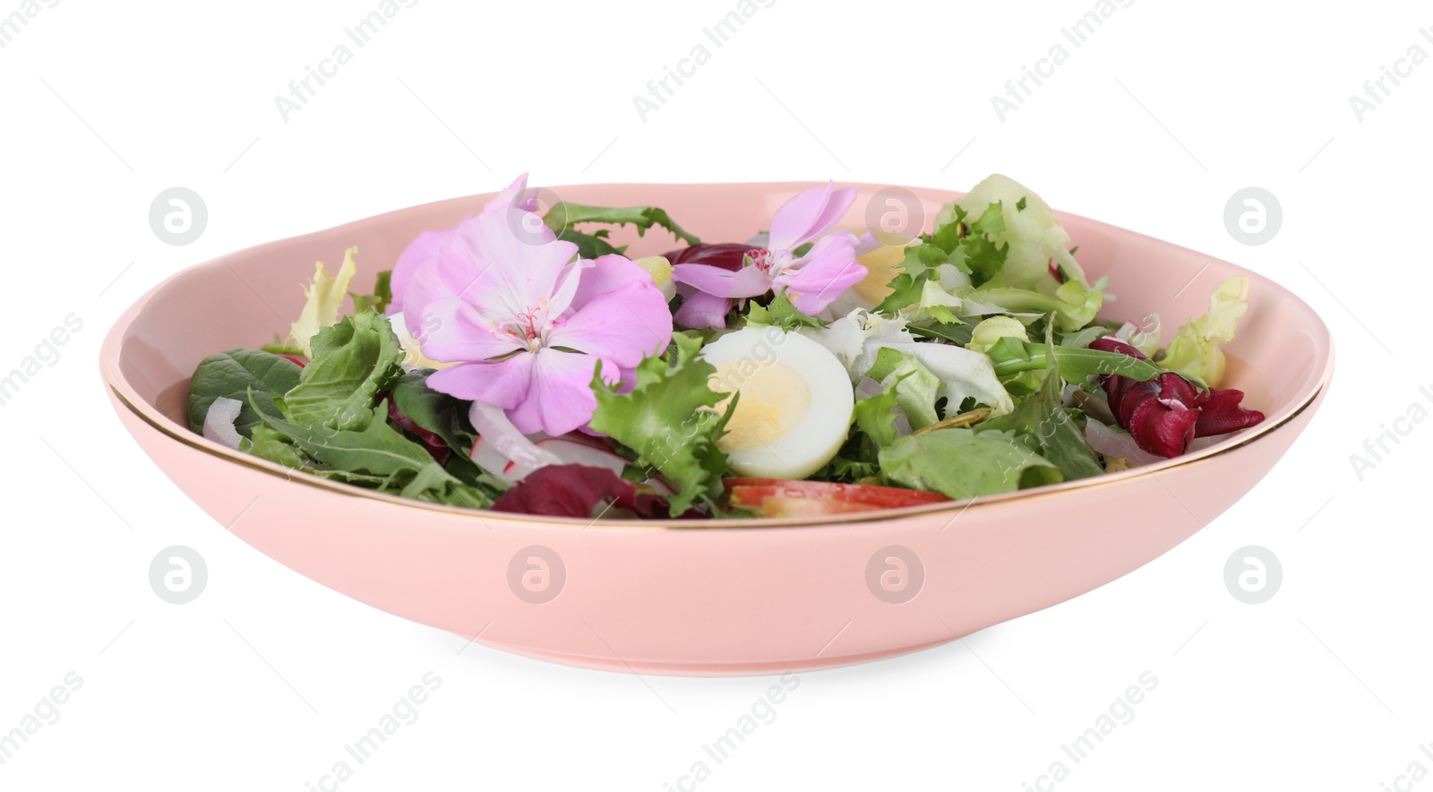 Photo of Fresh spring salad with flowers in bowl isolated on white