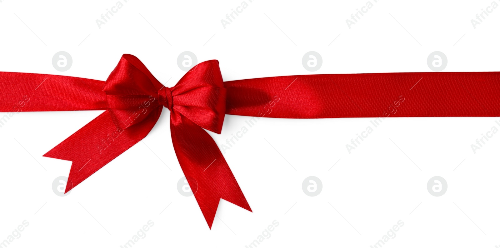 Photo of Red satin ribbon with bow isolated on white, top view