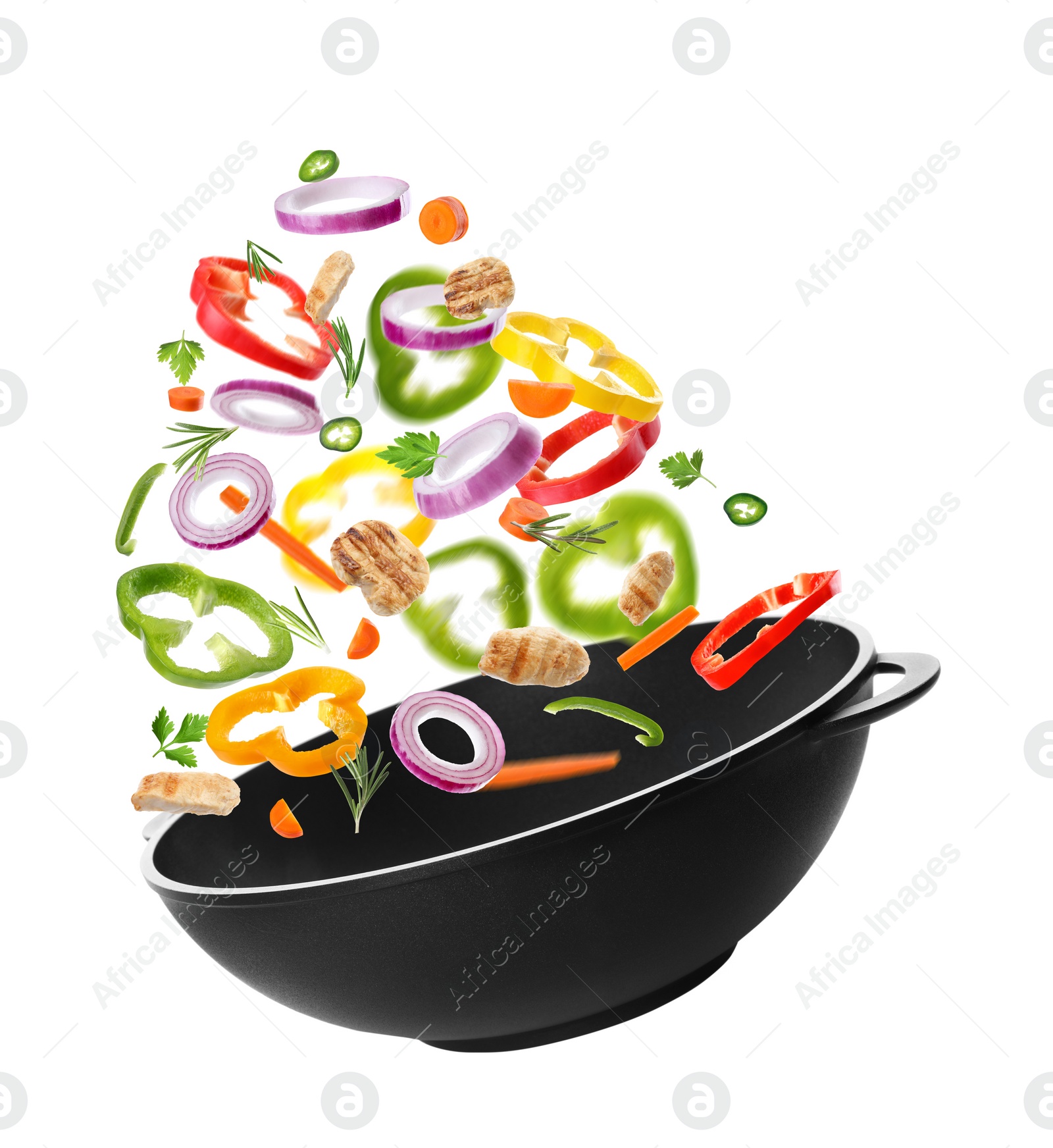 Image of Different tasty ingredients falling into wok on white background