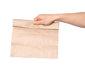 Man holding paper bag on white background. Food delivery service