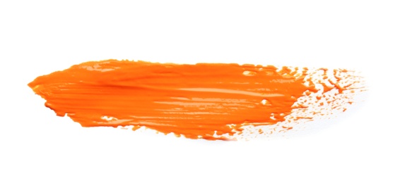 Abstract brushstroke of orange paint isolated on white