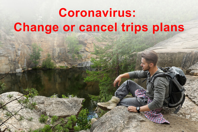 Image of Trips cancellation during coronavirus quarantine. Young man on rocky mountain near lake